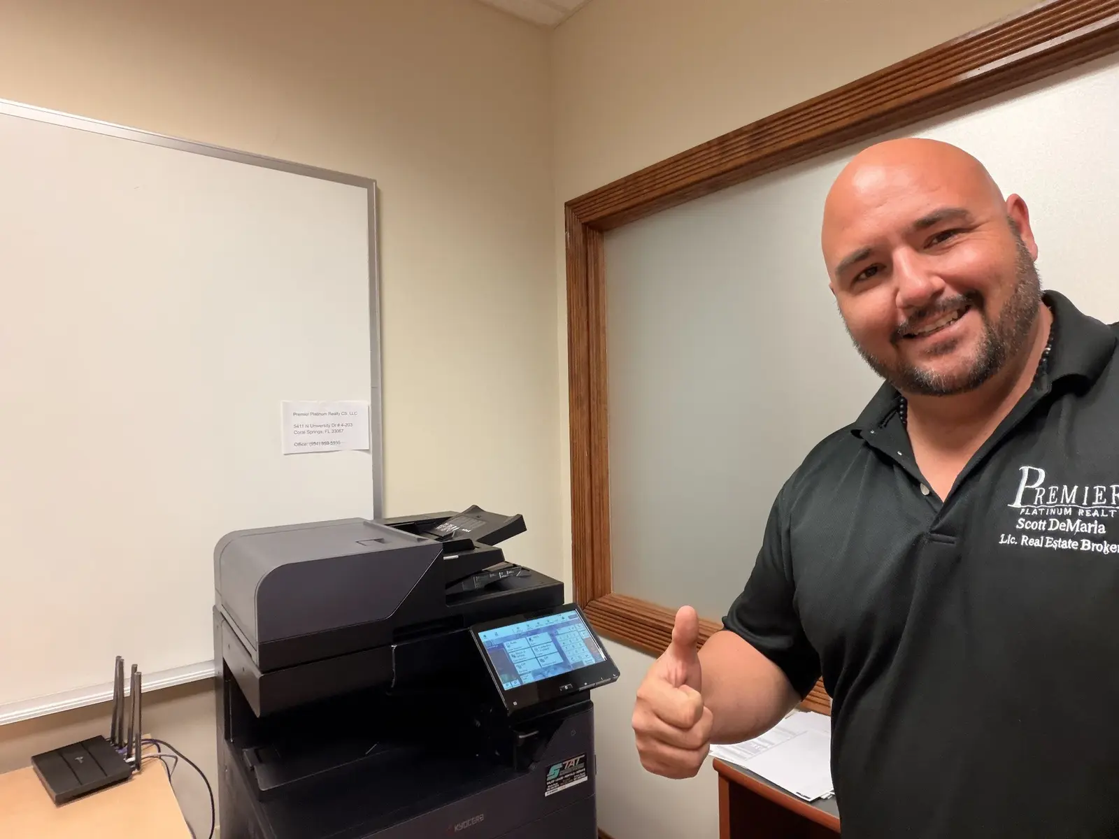 Healthcare office copier positioned in a controlled staff area