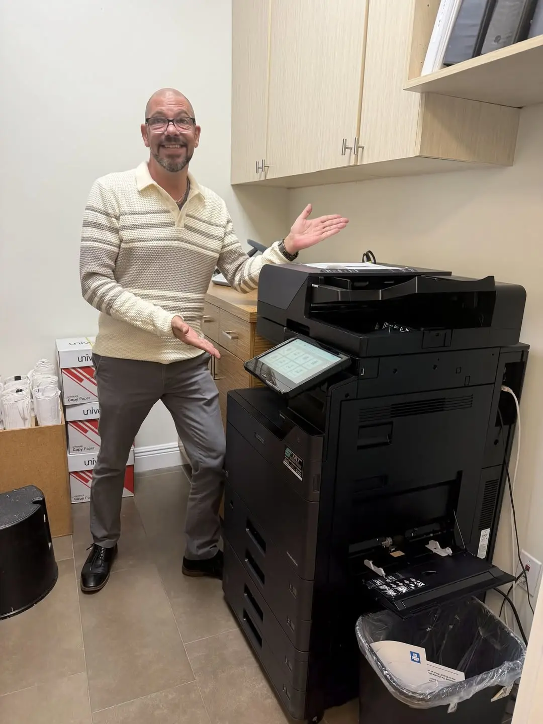 Employee authenticating at a Kyocera multifunction copier