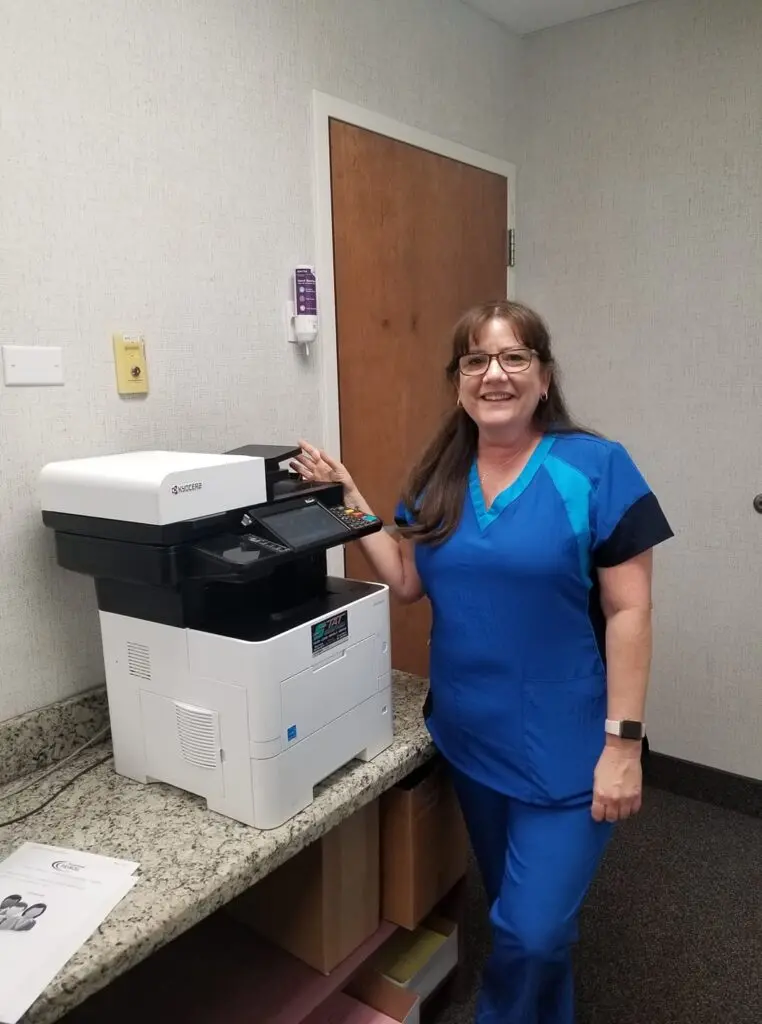 Local office equipment specialist supporting a business copier