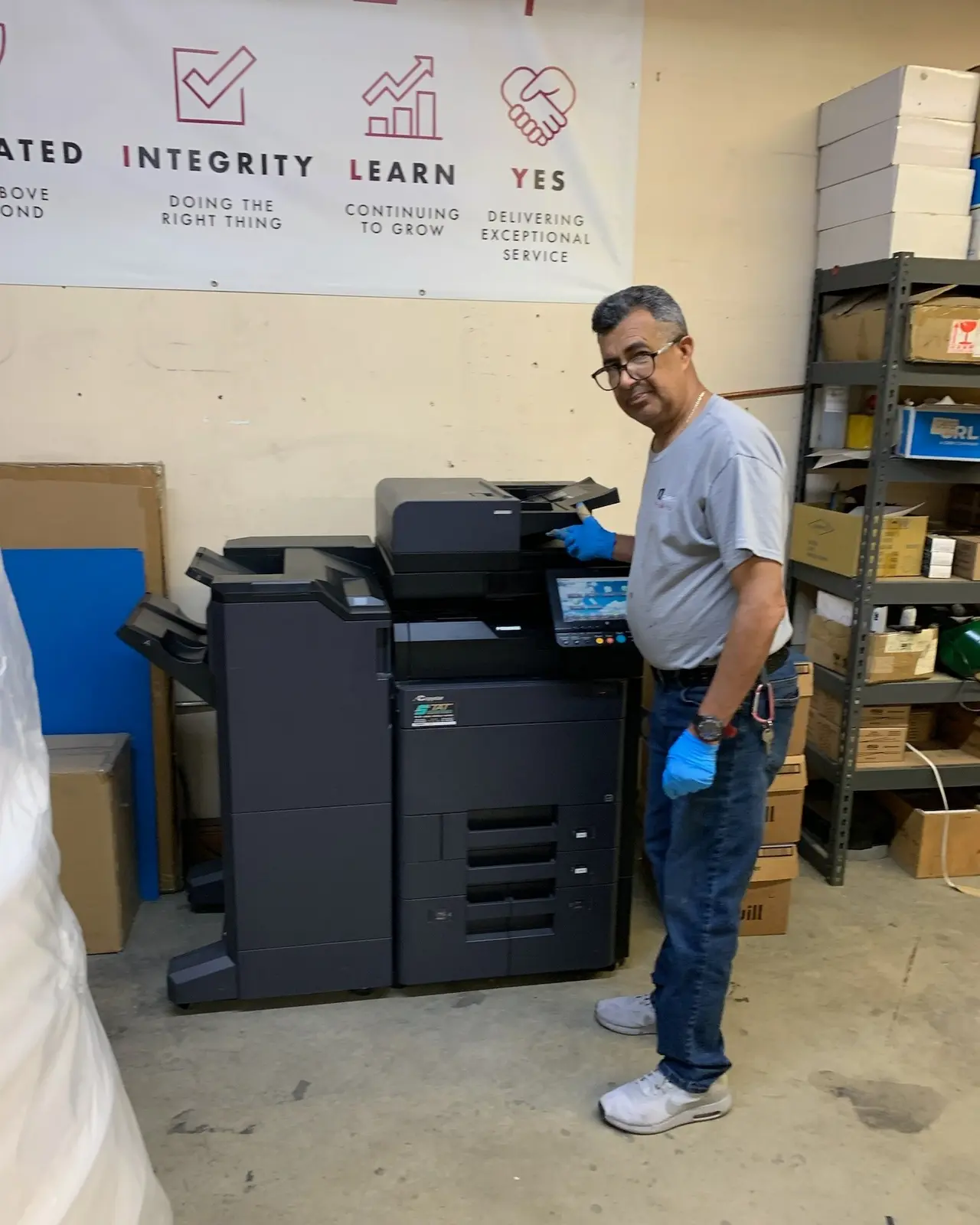 Office copier with paper stored nearby for daily use