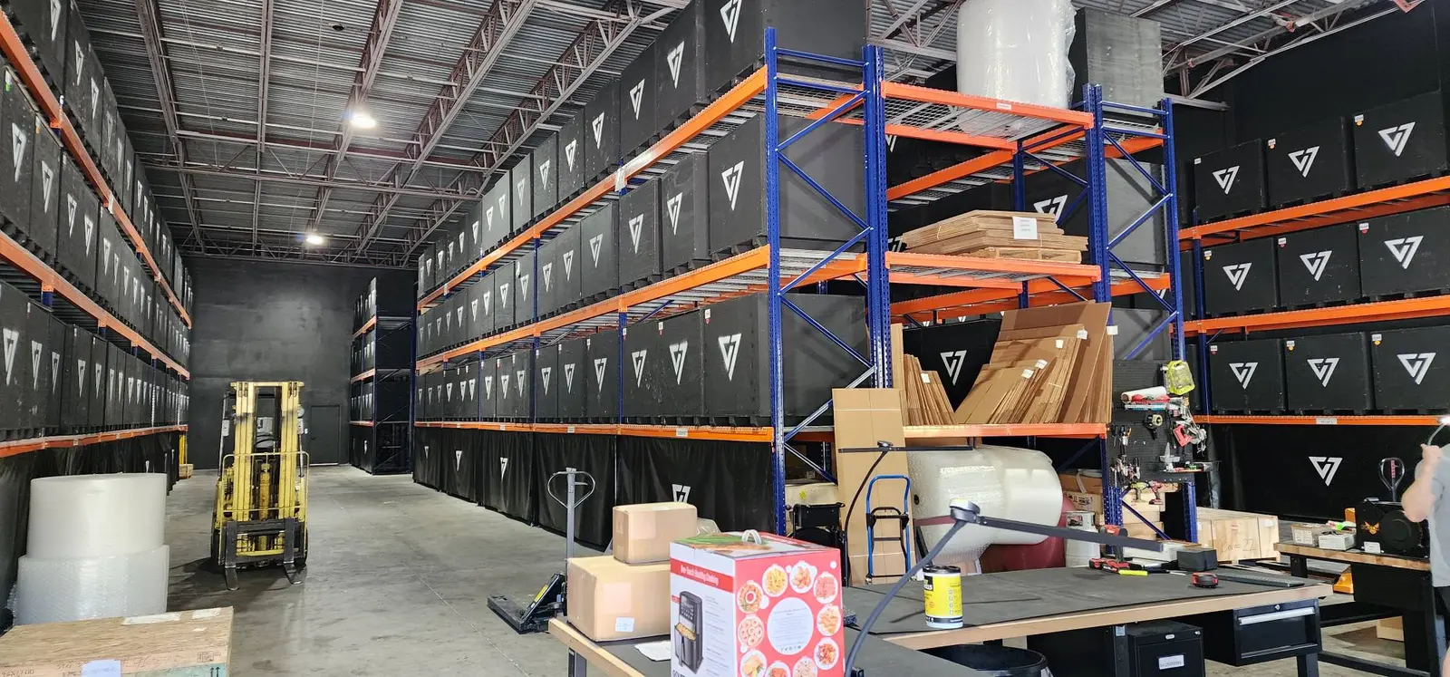 Wide-format printing equipment installed in a professional workplace
